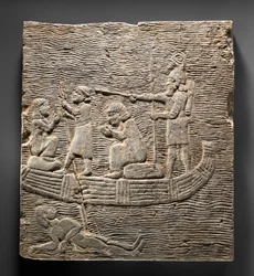 Relieve: Soldado asirio conduciendo cautivos a través del agua, c.668-627 a.C.